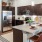 a kitchen with a marble island